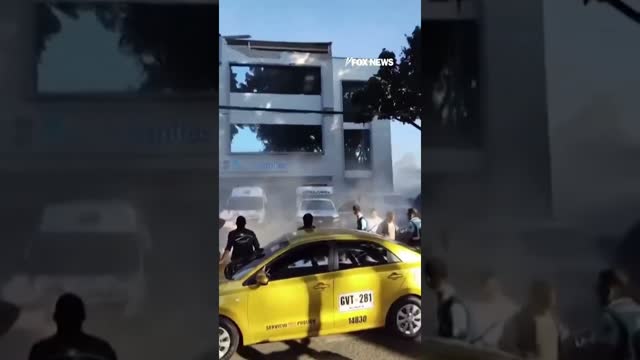 People FLEE as earthquake in Colombia sends debris CRASHING into ambulance #shorts #earthquake #news