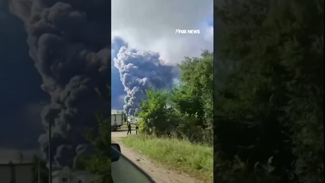 Thick smoke RISES after reported Ukrainian drone attack on Russian warehouse #shorts #us #news