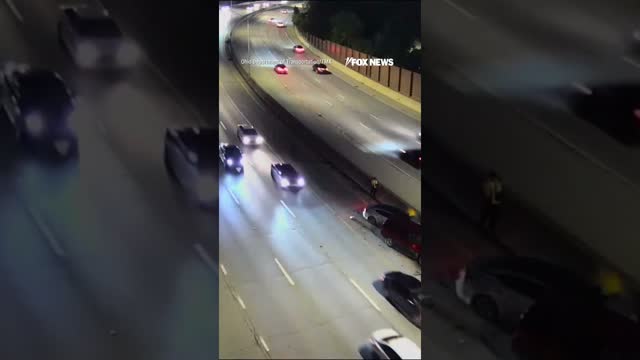 WATCH: Man NARROWLY ESCAPES being hit by car while stranded on highway #shorts #us #news #foxnews
