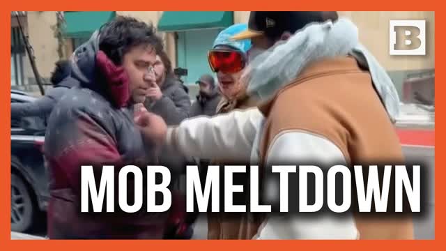Screaming Anti-ICE Minneapolis Mob Forces Man to Take Off "Freedom" Hoodie